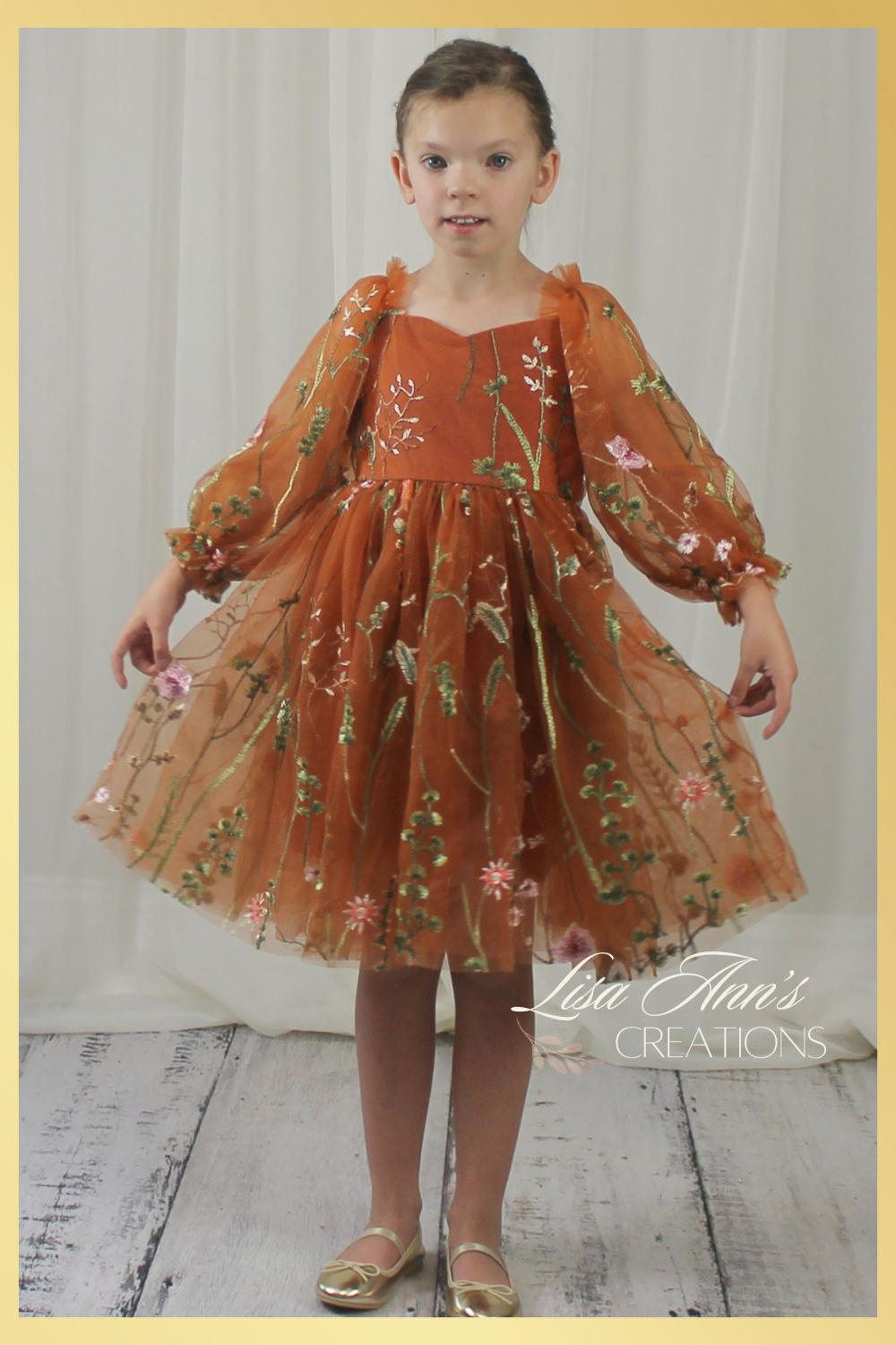 Fall Floral girl dress in burnt orange floral embroidery with long tulle sleeves and knee length style.