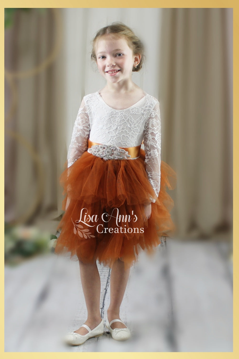 Burnt Orange Flower Girl dress in long sleeves and knee length style