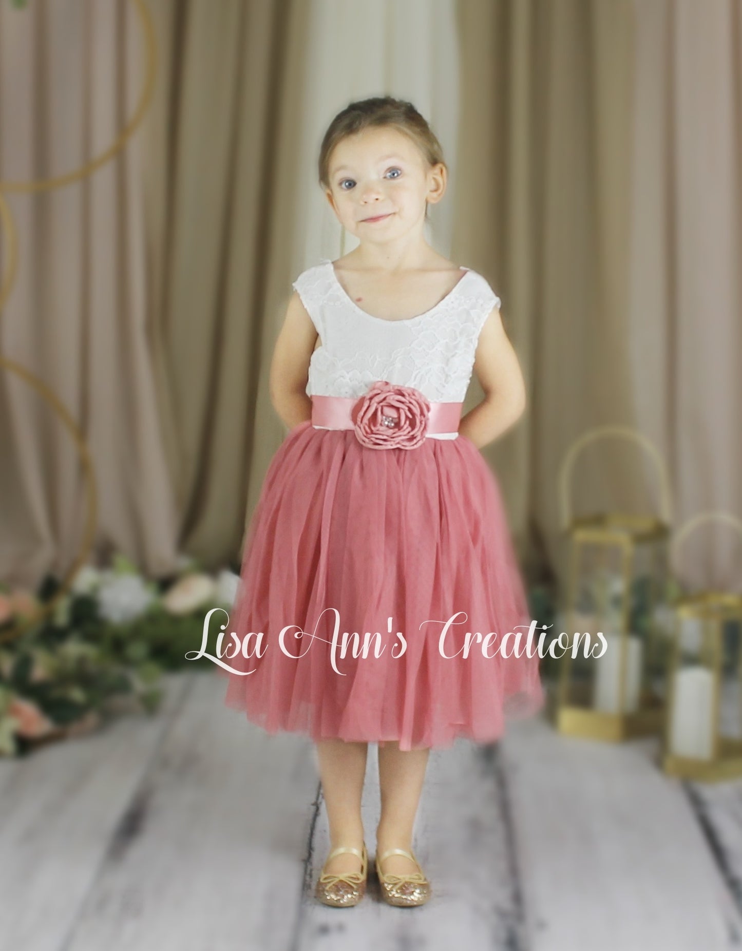 sleeveless flower girl dress in dusty rose knee length tulle