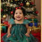baby girl Christmas dress in green tulle with a candy cane sparkly print. 