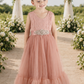 blush flower girl dress in a full mermaid style skirt in sleeveless lace and tulle bottom. 