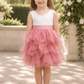 blush flower girl dress in a tiered sleeveless tutu style. In lace and tulle. 