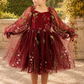 Flower girl dress in embroidered burgundy floral with tulle long sleeves and knee length style dress. Perfect for fall weddings.  