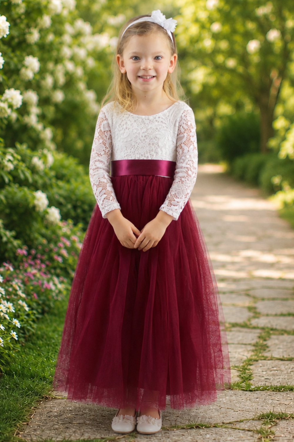 burgundy flower girl dress in tulle and lace. Long sleeve white lace with a full length tulle skirt. 