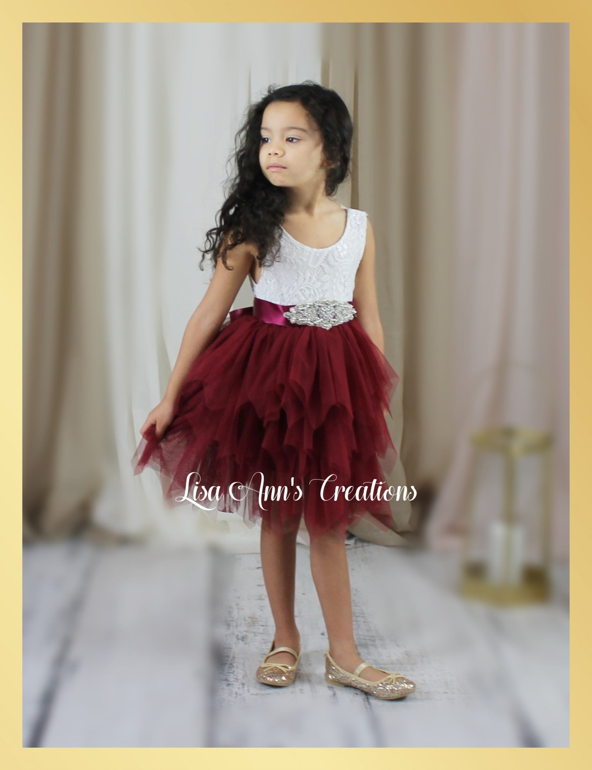 flower girl dress in burgundy tulle with sleeveless white lace bodice for wedding