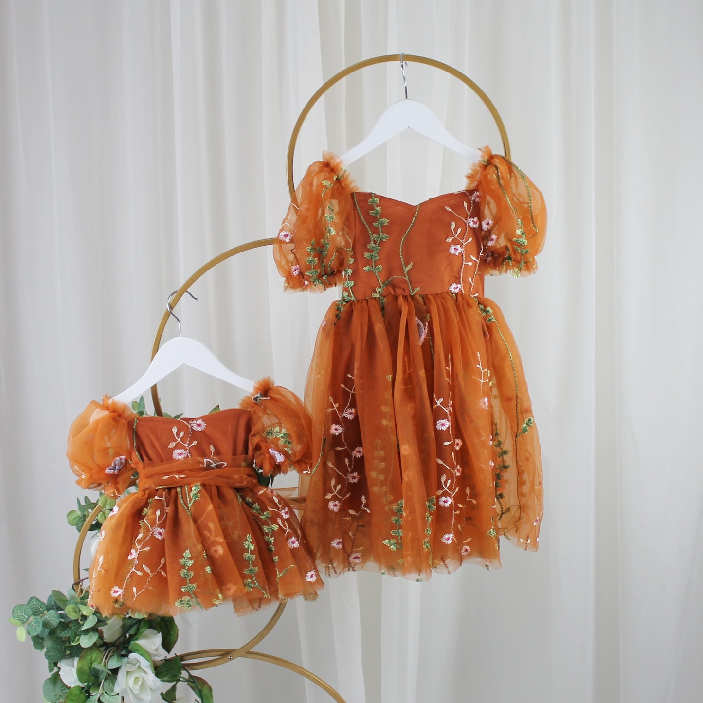 Autumn baby dress with burnt orange floral embroidery and sweetheart neckline