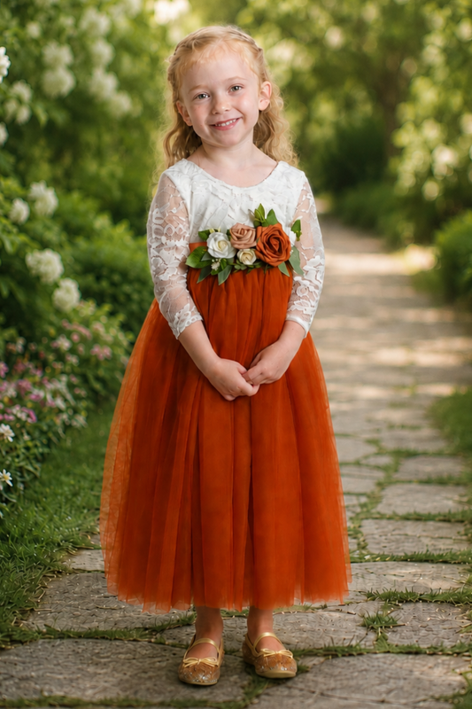 Burnt orange flower girl dress with long lace sleeves and large flower sash