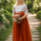 Burnt orange long sleeve flower girl dress