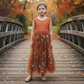 Toddler Flower girl dress in burnt orange floral. Burnt orange sleeveless lace top and burnt orange floral tulle bottom. 