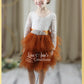 Burnt Orange Flower Girl dress in long sleeves and knee length style