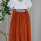 Tulle flower girl dress in burnt orange with white lace and flower jewel sash