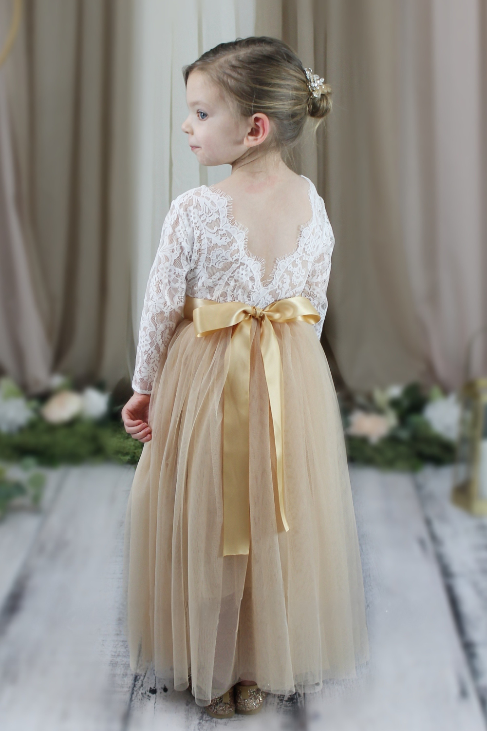 Champagne flower girl dress with full length tulle and white lace long sleeve bodice 