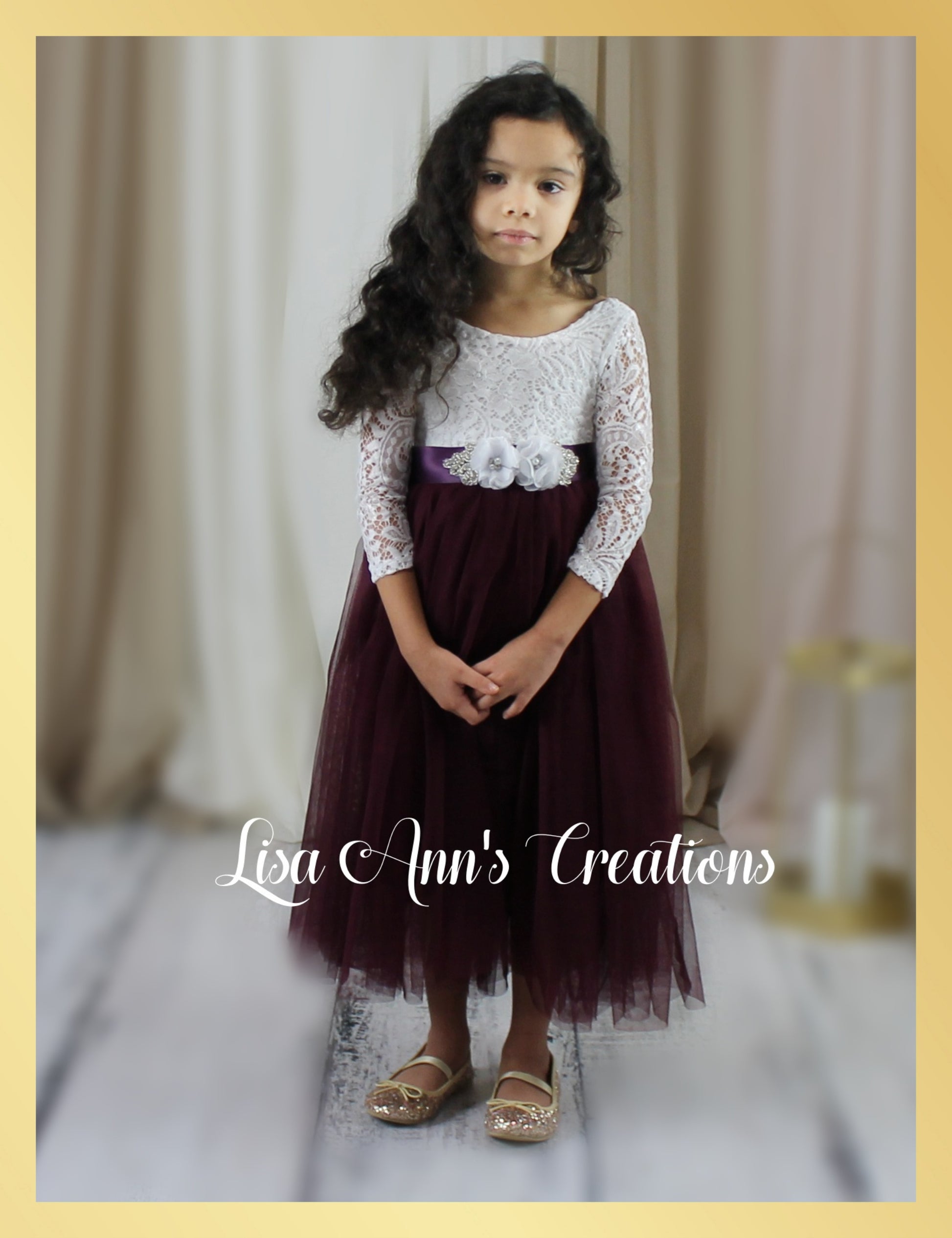 Jewel tone wedding with flower girl in dark plum tulle