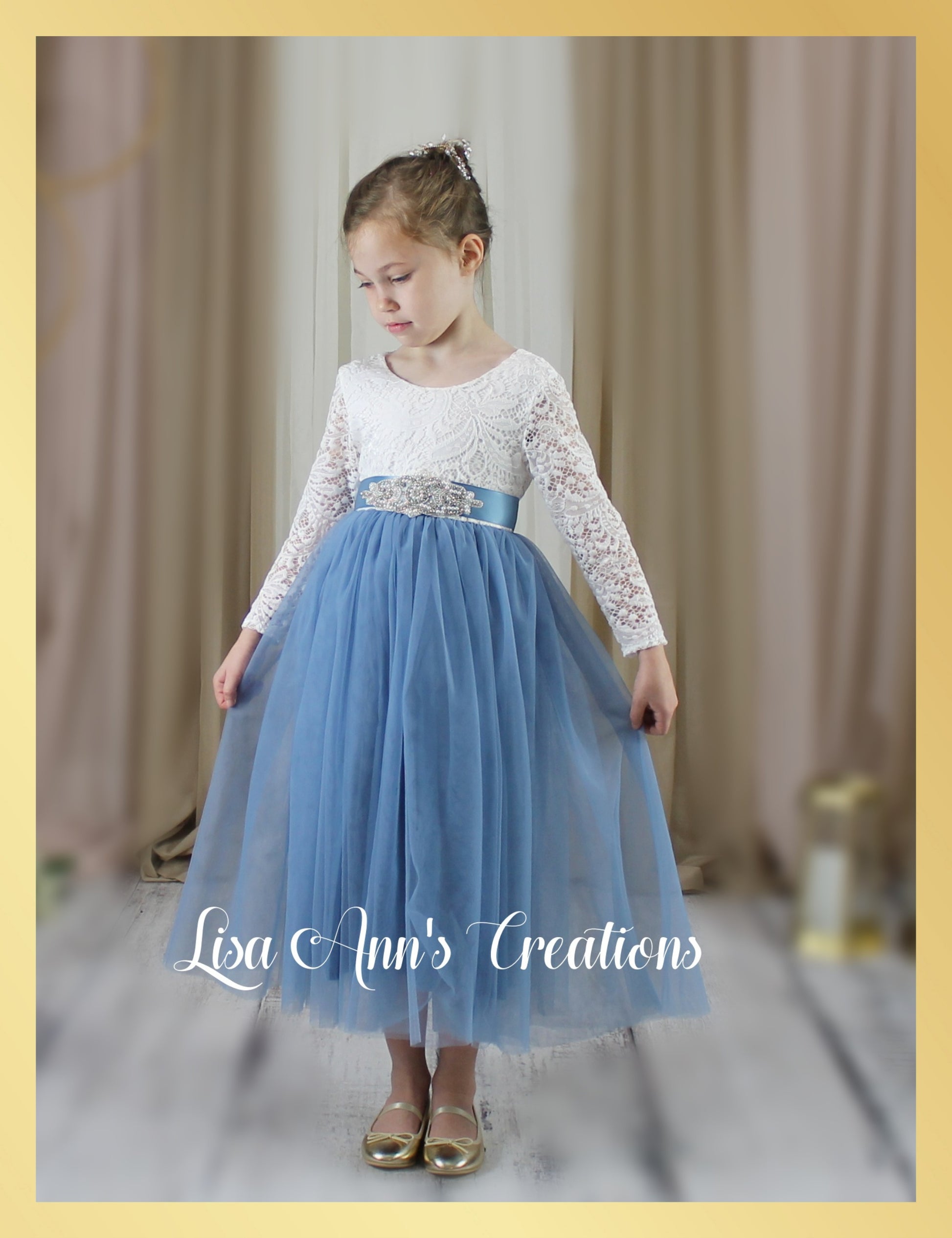 junior bridesmaid dress in dusty blue tulle with white long sleeve lace bodice for winter wedding