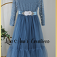 Girls Christmas dress in a dusty blue lace and tulle. Mermaid full length style and long sleeves.