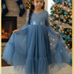 Girls Christmas dress in a dusty blue lace and tulle. Mermaid full length style and long sleeves.