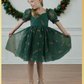 Girls Candy Cane Christmas Dress in green tulle with glitter candy cane pattern. Sweetheart neckline, short sleeves, and knee length style