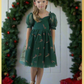 Girls Candy Cane Christmas Dress in green tulle with glitter candy cane pattern. Sweetheart neckline, short sleeves, and knee length style