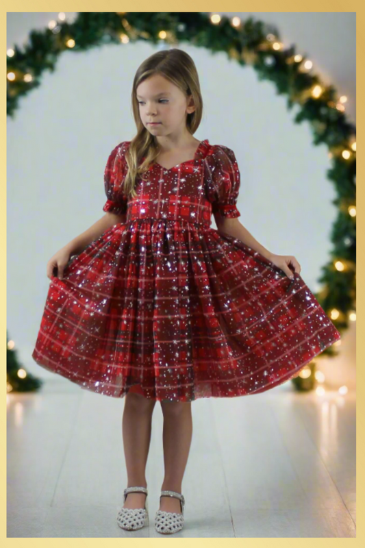 Girls red and green plaid Christmas dress in a short sleeve sweetheart neckline and knee length style. For holiday parties and family photos. 