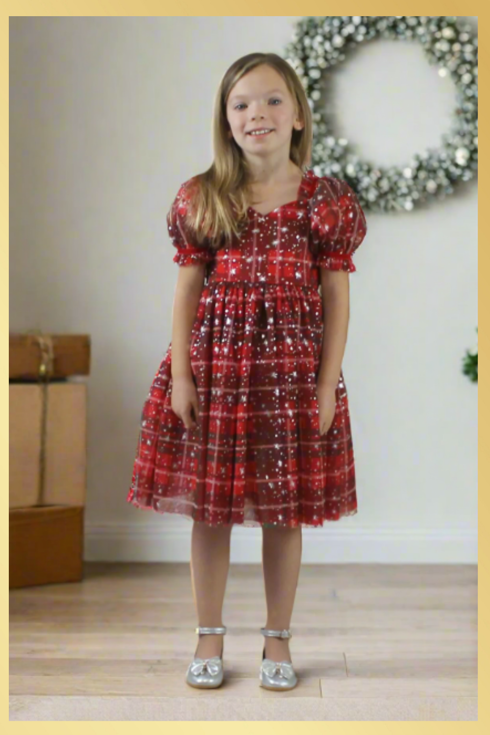 Girls red and green plaid Christmas dress in a short sleeve sweetheart neckline and knee length style. For holiday parties and family photos. 