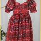 Girls red and green plaid Christmas dress in a short sleeve sweetheart neckline and knee length style. For holiday parties and family photos. 