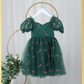 Girls Christmas dress in Green tulle with red and gold candy canes. Shorts Sleeves and knee length style. 