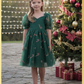 Girls Christmas dress in Green tulle with red and gold candy canes. Shorts Sleeves and knee length style. 