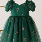 Baby girl Christmas outfit in green tulle with red and gold candy cane details and a built-in bodysuit.