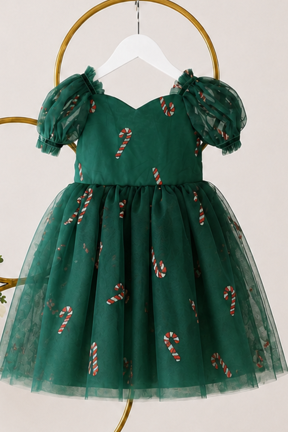 Baby girl Christmas outfit in green tulle with red and gold candy cane details and a built-in bodysuit.