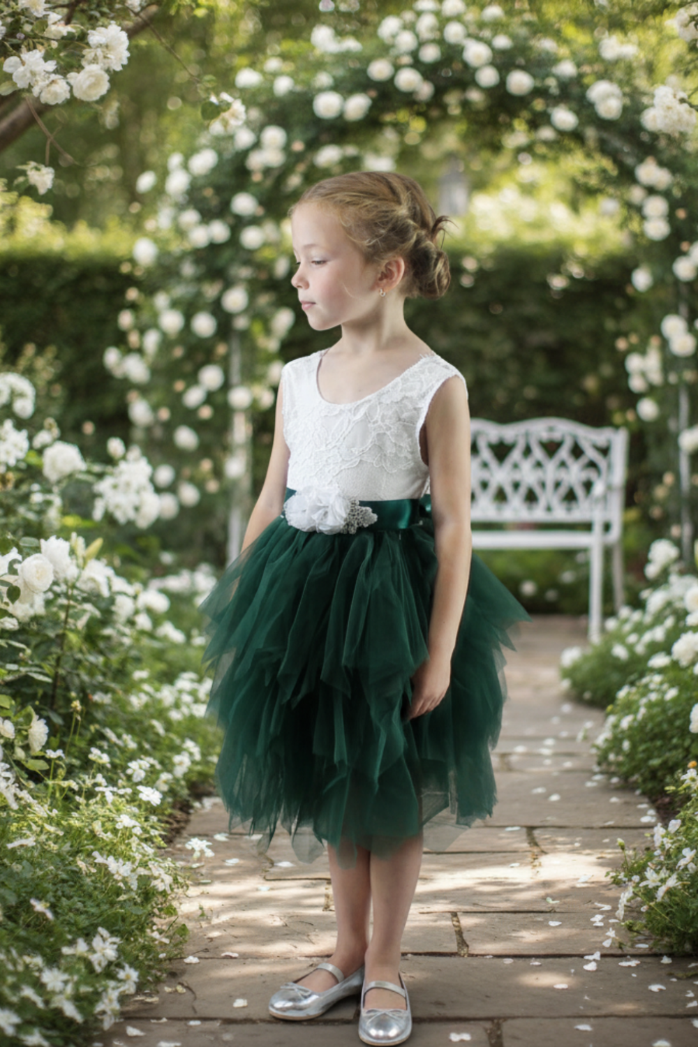 Hunter Green flower girl dress i a tiered tutu style with white lace in a sleeveless style. 