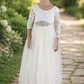 Lace Flower Girl Dress in ivory with long sleeves, soft tulle skirt and classic wedding style