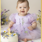 First birthday baby girl dress romper in a lavender floral embroidery tulle. 