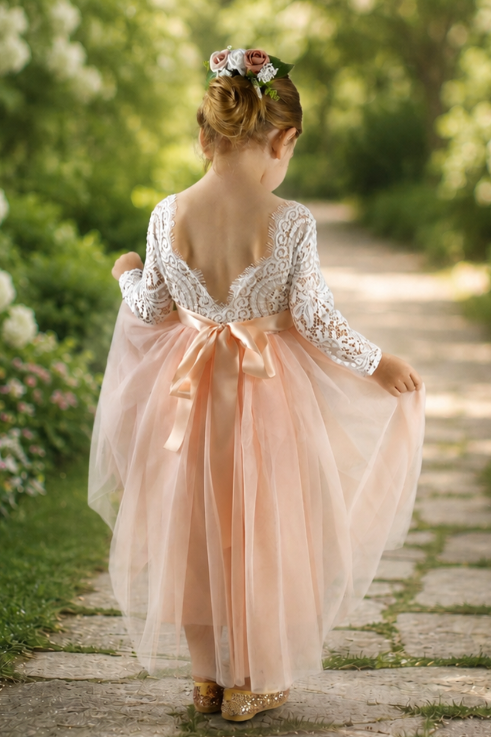Flower girl dress in light peach tulle, long sleeve white lace and full length style.  