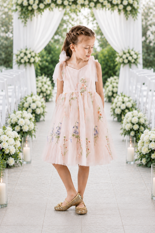light pink floral flower girl dress in with embroidered tulle. 