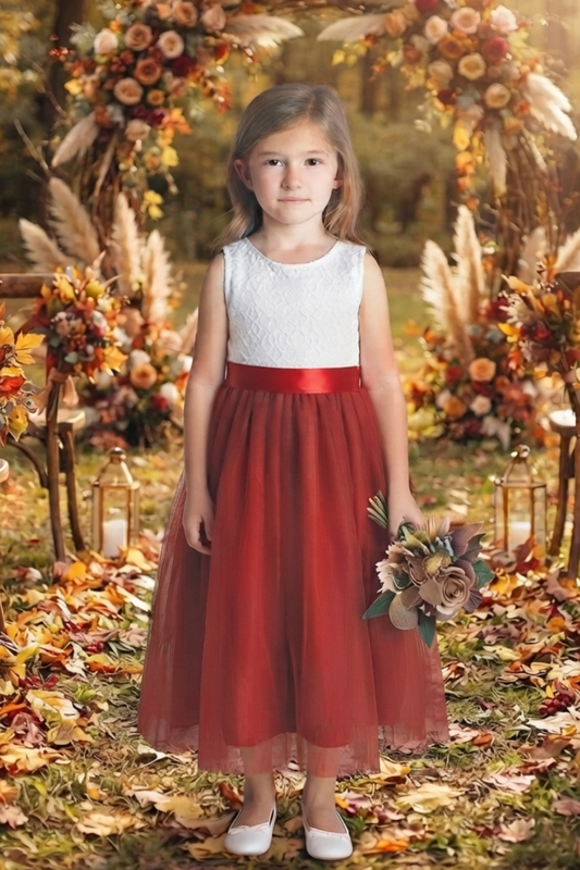 Flower girl dress in rust tulle with white lace sleeveless bodice.  In a full length styel