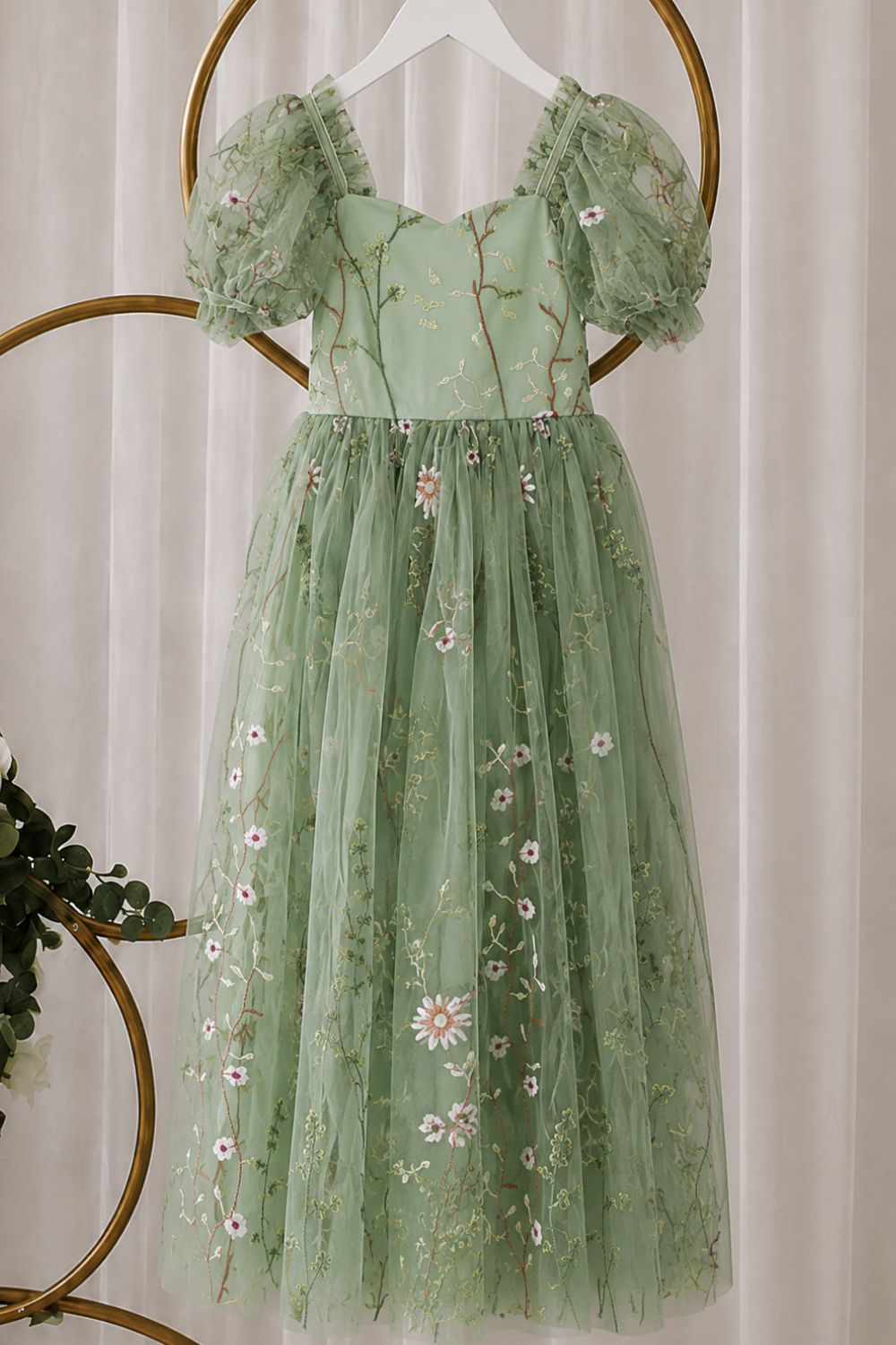 floral  sage flower girl dress in full length with puffy sleeves and in bow in back. 