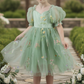 Floral flower girl dress in sage green tulle with embroidery flowers. 