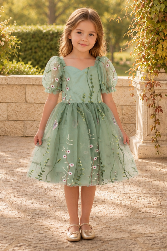 wildflower flower girl dress in a fall sage embroidered floral tulle with big puffy sleeves and a knee length style dress. 