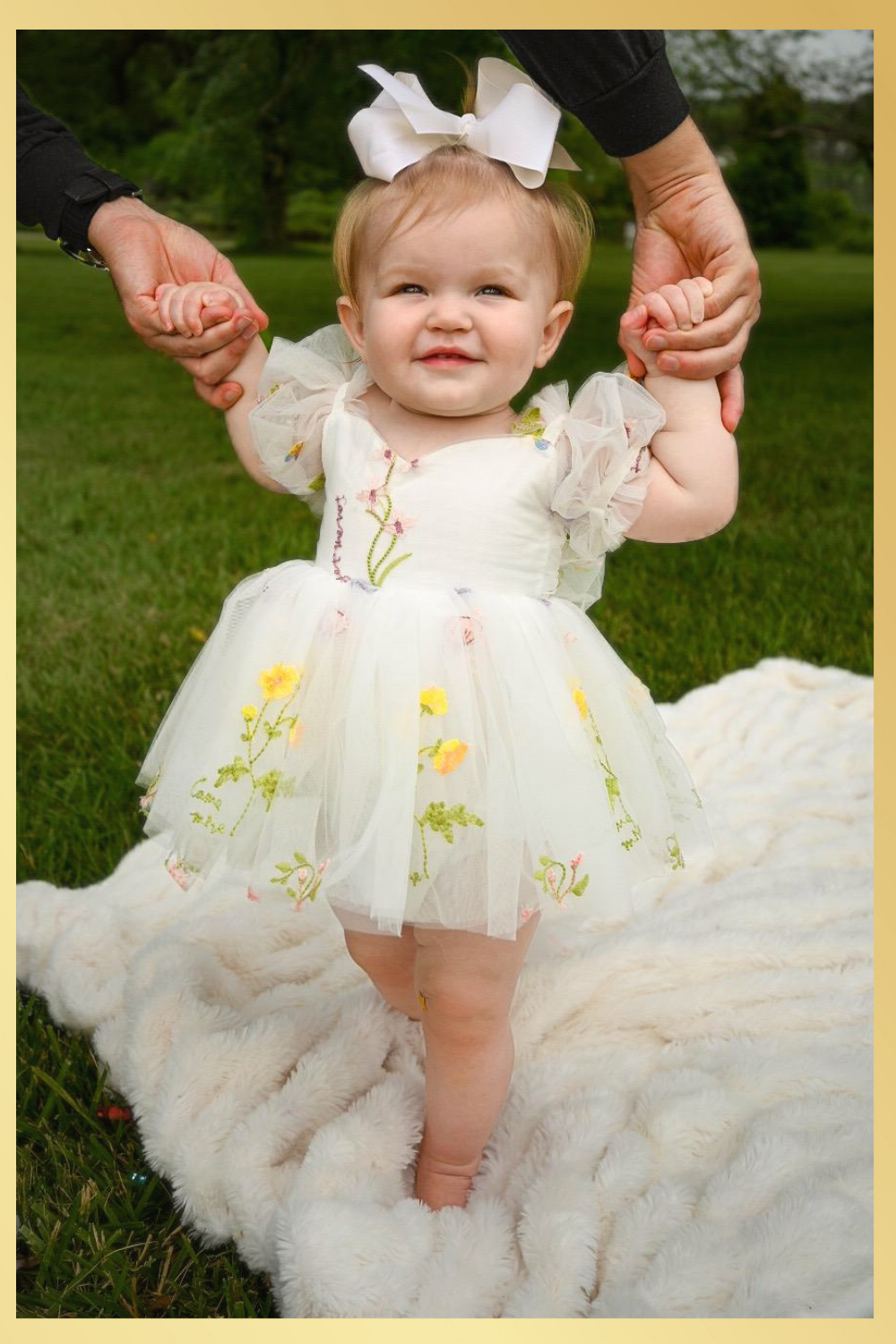 white flower girl dress with embroidered flowers
