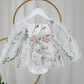 white floral flower girl dress for baby's, toddlers and little girls. made with long sheer sleeves a sweat heart neckline and knee length style for all your special occasions.