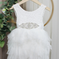 White Flower Girl Dress in white lace sleeveless top and white tiered tutu style knee length style. 