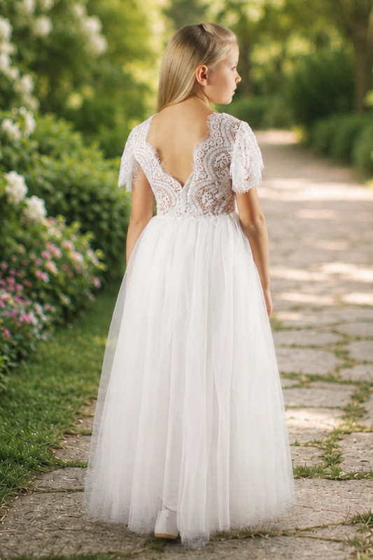 White flower girl dress in tulle and lace short sleeves and full length style.