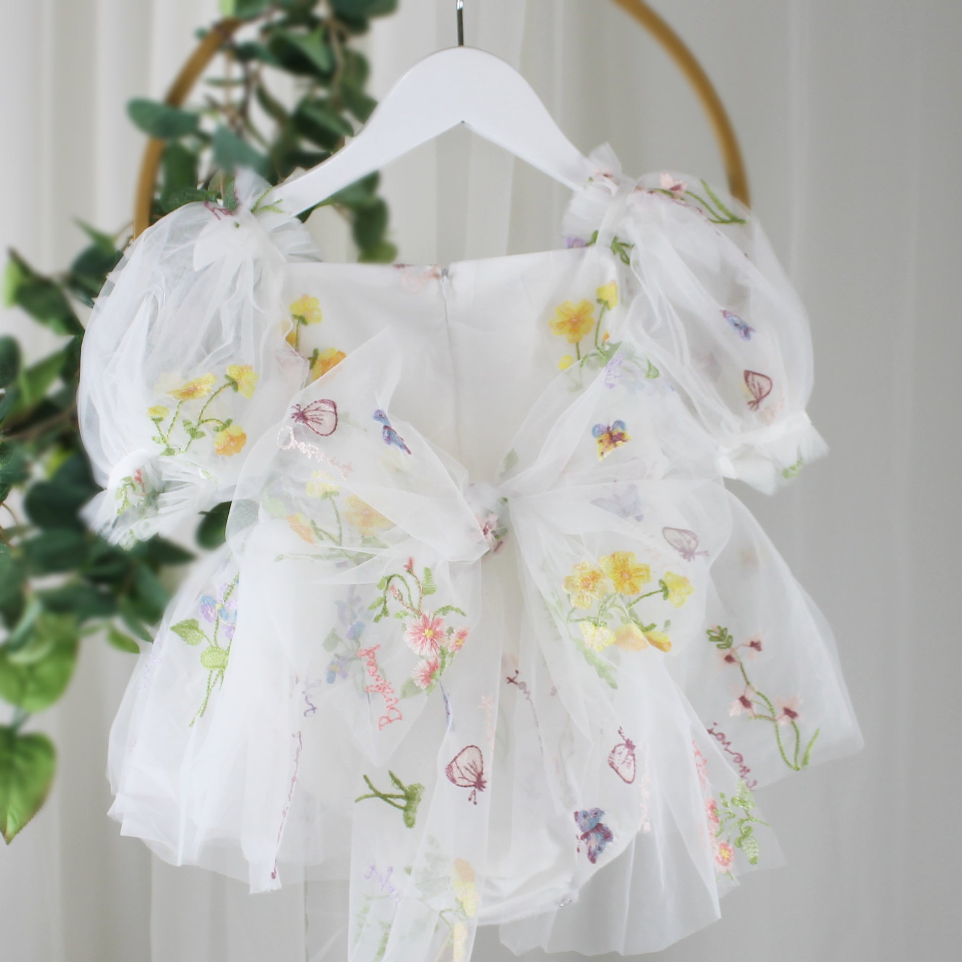 White floral flower girl dress for spring and summer weddings or other special occasions like birthdays and holidays. 