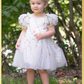 White floral girls and baby dress for flower girls, first birthdays and special occasions.  Sweetheart neckline, puffy sleeves, and knee length style in a fall floral tulle dress.