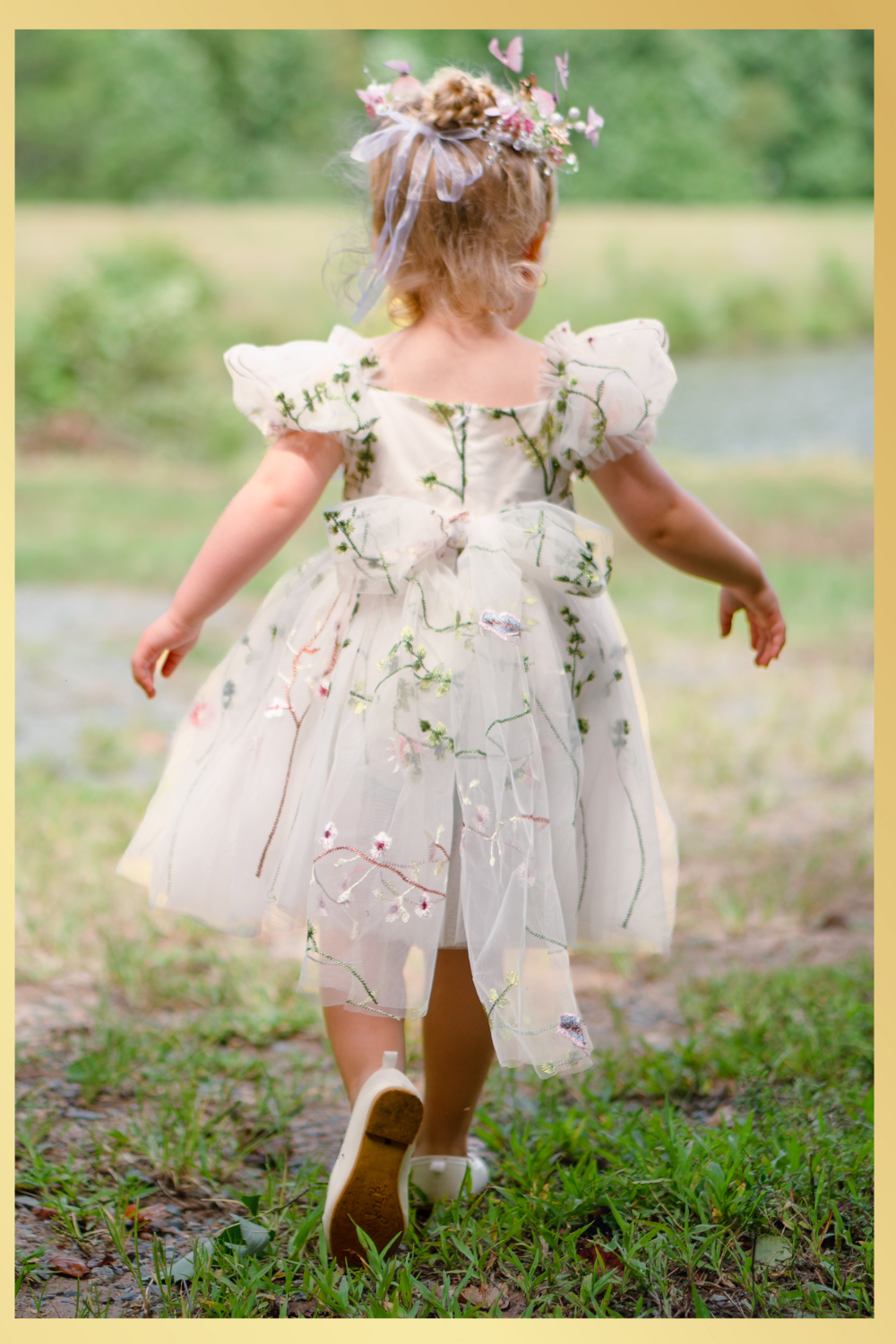 White floral girls and baby dress for flower girls, first birthdays and special occasions.  Sweetheart neckline, puffy sleeves, and knee length style in a fall floral tulle dress.
