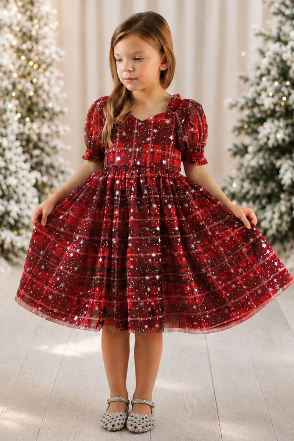 girls Christmas dress in red and green plaid with stars and glitter.  Short puffy sleeves and nee length style dress. 