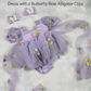 First birthday baby girl dress in lavender floral tulle with built in romper/bodysuit and puffy  short sleeves.