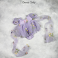 First birthday baby girl dress in lavender floral tulle with built in romper/bodysuit and puffy  short sleeves.