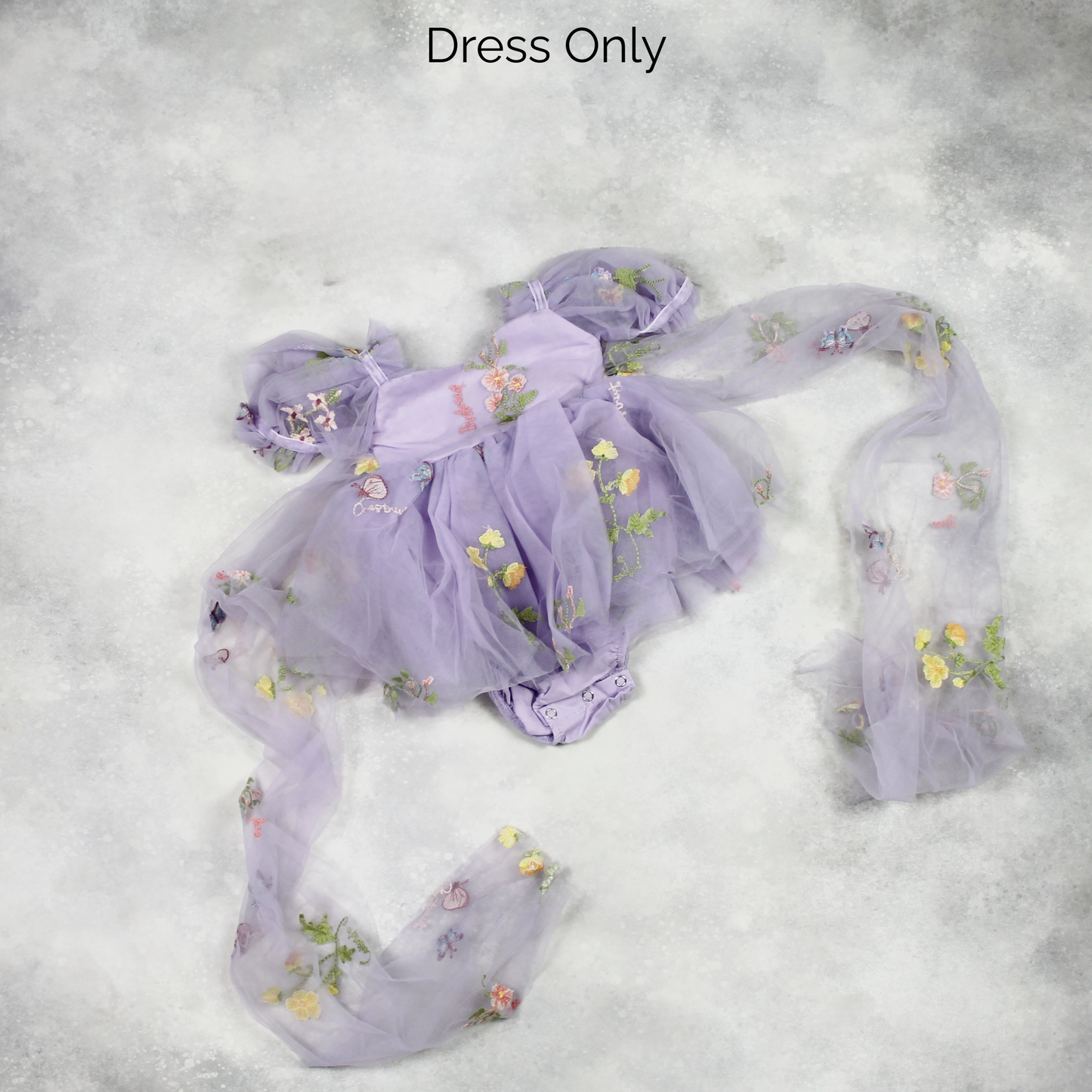 First birthday baby girl dress in lavender floral tulle with built in romper/bodysuit and puffy  short sleeves.