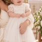 christening dress in white for a baby girl. 